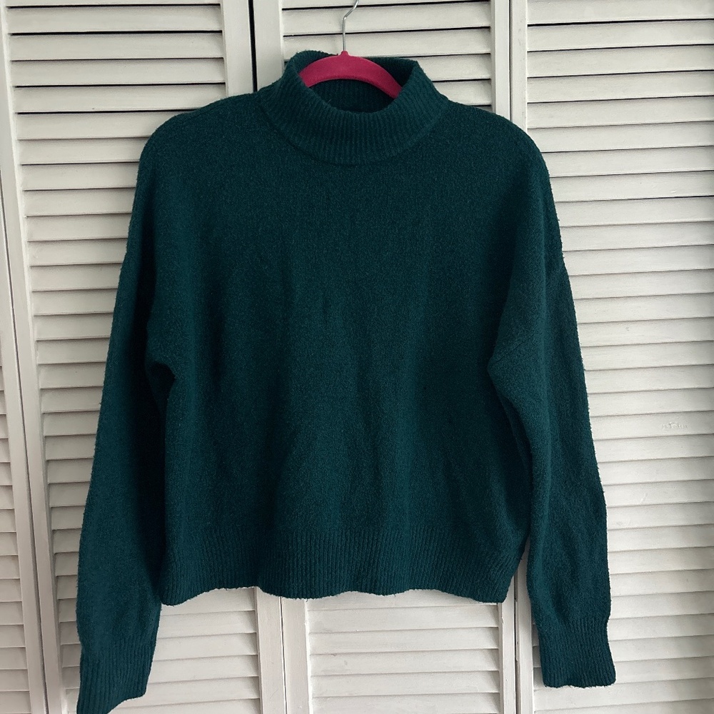 Green mock turtleneck sweater